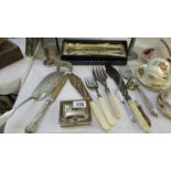 A mixed lot of silver plate including fish servers, cigarette box etc.