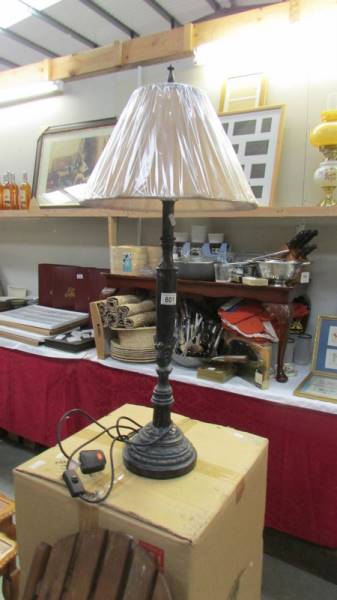 A good quality new antique effect table lamp with shade. (collect only).