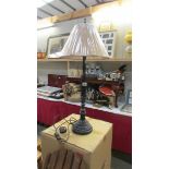 A good quality new antique effect table lamp with shade. (collect only).