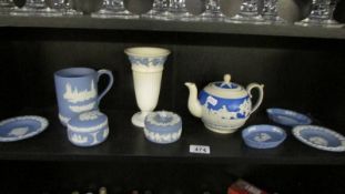 A good lot of Wedgwood Jasper ware including tankard and vase.