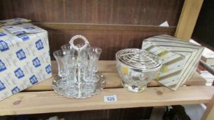 A boxed set of Queen Anne sherry glasses on silver plate tray and a boxed crystal and silver plate