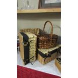 3 wicker/rattan hampers and a lidded basket