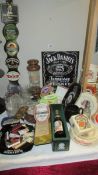 A large quantity of vintage breweriana pub items including ashtrays, pump clips, glasses,