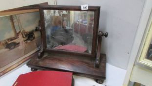 A mahogany toilet mirror. (collect only).