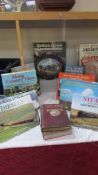 A good lot of locomotive railway books and a framed Wedgwood plate,