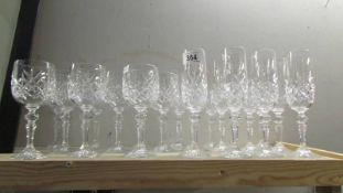 A good quantity of cut glass wine and champagne glasses