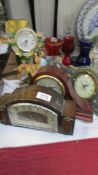 An art deco clock and three others.