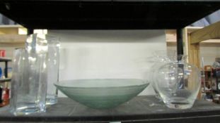 A large art glass fruit bowl and four glass vases.