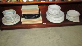 A quantity of modern tableware, plates, bowls etc.