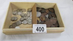 A mixed lot of coins including silver threepenny bits.