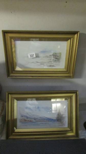 A pair of framed and glazed lake scenes signed W Laidler 1902