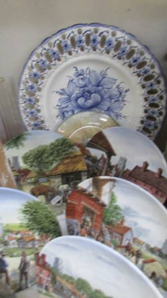 A large lot of collector's plates including Royal Doulton. (collect only).
