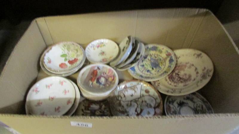 A box of antique and vintage plates etc.
