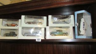 Six boxed 1/32 scale die cast model cars including Mercedes, Cadillac, etc.