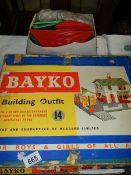 A Bayko building outfit No, 14 and a box of parts, completion unknown.