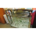 A 1950's sliding door china cabinet. (Collect only)