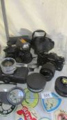 A quantity of camera's and lenses.
