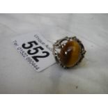 A silver ring set Tiger's eye stone.