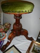 A Victoran mahogany piano stool. (Collect only)