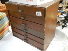 A set of filing drawers. (collect only)