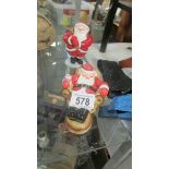 Two Beswick Santa Clause figures.