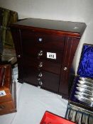 A good quality mahogany effect jewellery chest.