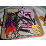 A mixed lot of old scissors.