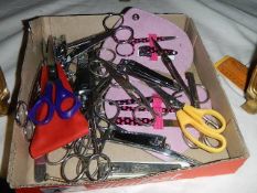 A mixed lot of old scissors.