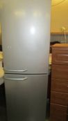 A new Bosch silver coloured fridge freezer, (Collect only)