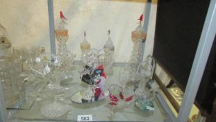 A quantity of glass ornaments including Blackpool tower, animals etc.,