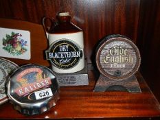 Three items of pub memorabilia.