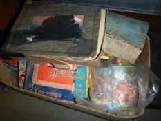 A box of old jigsaw puzzles (completeness unknown and boxes in poor condition.)