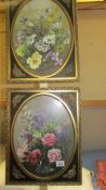 A pair of metal framed floral pictures. (Collect only)