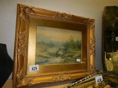 A gilt framed bridge scene.