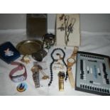 A mixed lot including scent bottle, badges, watches etc.,