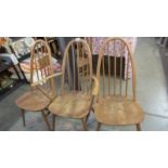 Three Ercol style chairs. (Collect only)