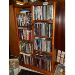 A large lot of CD's with shelf. (Collect only)