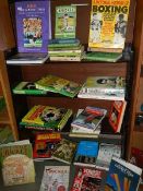 A large lot of sport related books.