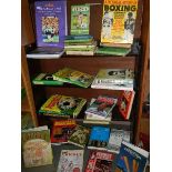 A large lot of sport related books.