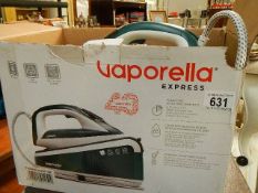 A Vaporella iron in box.