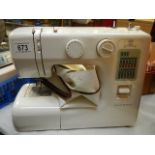 A Janome electric sewing machine, missing foot pedal. (collect only)