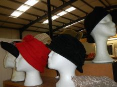 A quantity of vintage hats (heads not included).