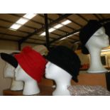 A quantity of vintage hats (heads not included).