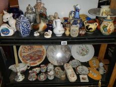 Two shelves of ceramic items including figures, plates etc., (collect only)