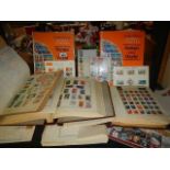 A quantity of albums of assorted stamps.