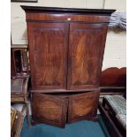 Georgian Mahogany Linen Press, a moulded cornice over 2 upper doors inlaid with oval panels and
