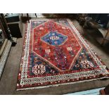 Red ground Persian Kashkai Nomadic Rug, traditional medallion design, multiple borders, 2.4m x 1.