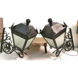 Matching Pair of Cast Iron electric Stable Lamps, with curved brackets, painted black, each 65cmH