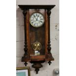 Spring Driven Wall Clock in a Walnut Case, cream dial, 100cmH