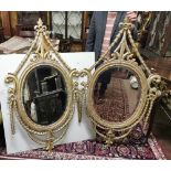 Matching Pair of Carved Gilt Wood Framed Girondale Style Wall Mirrors, mid-20thC, oval shaped